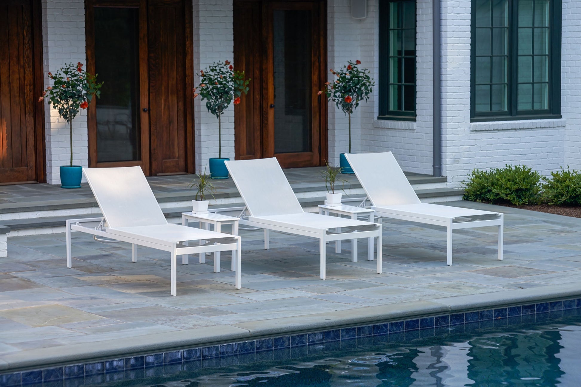 -Telescope Casual-Kendall Sling Armless Chaise (High Seat)-Pangaea Patio-Lifestyle Image