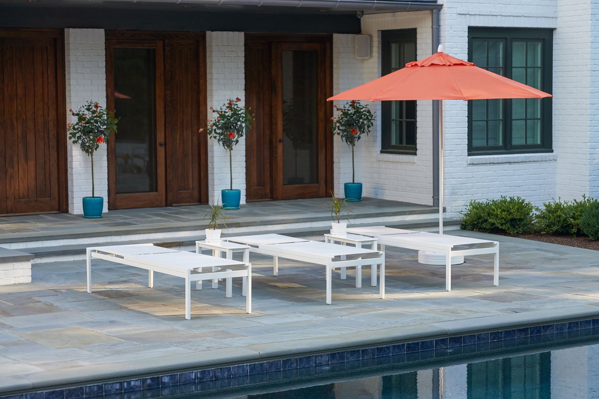 -Telescope Casual-Kendall Sling Armless Chaise (High Seat)-Pangaea Patio-Lifestyle Image