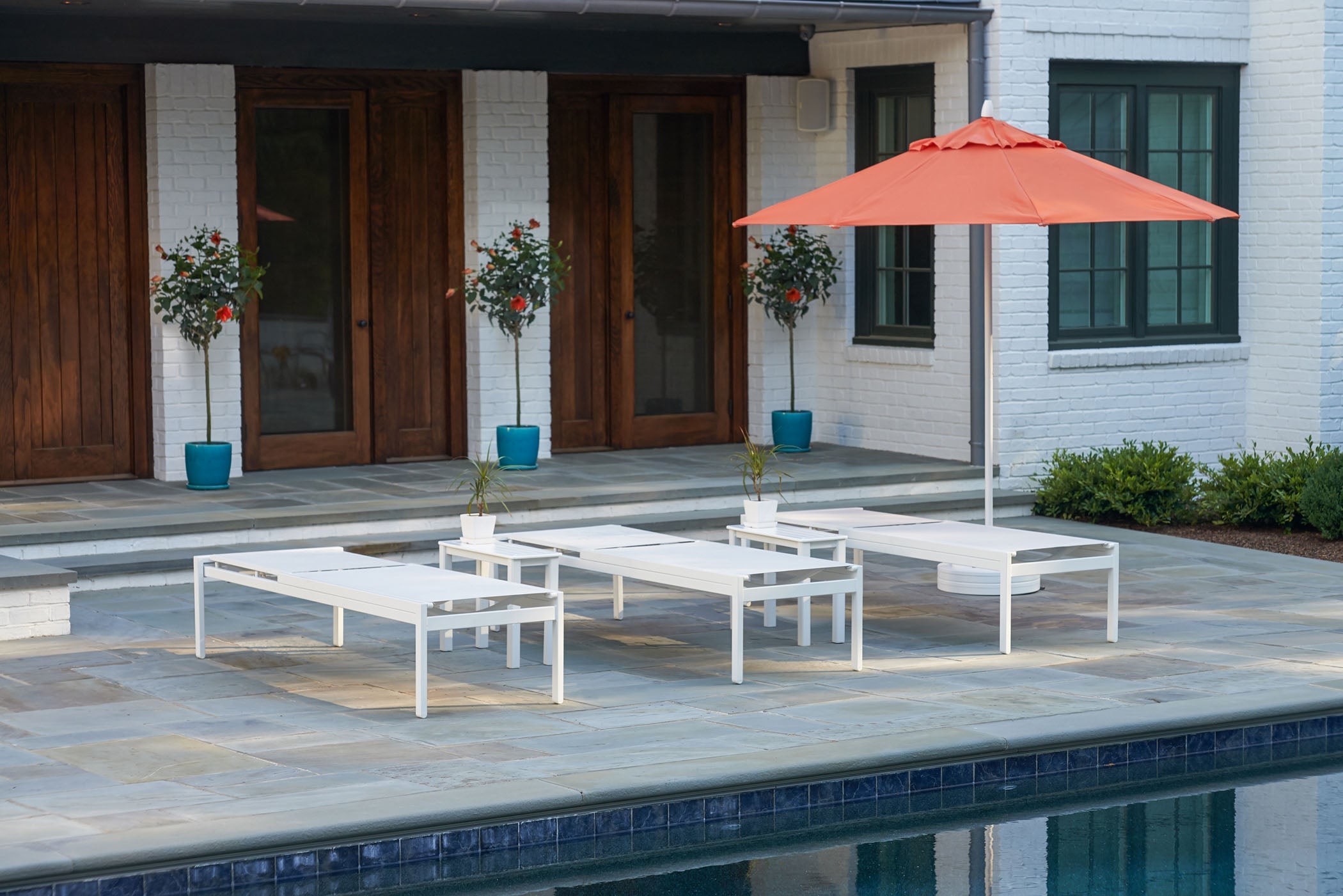 -Telescope Casual-Kendall Sling Armless Chaise (High Seat)-Pangaea Patio-Lifestyle Image